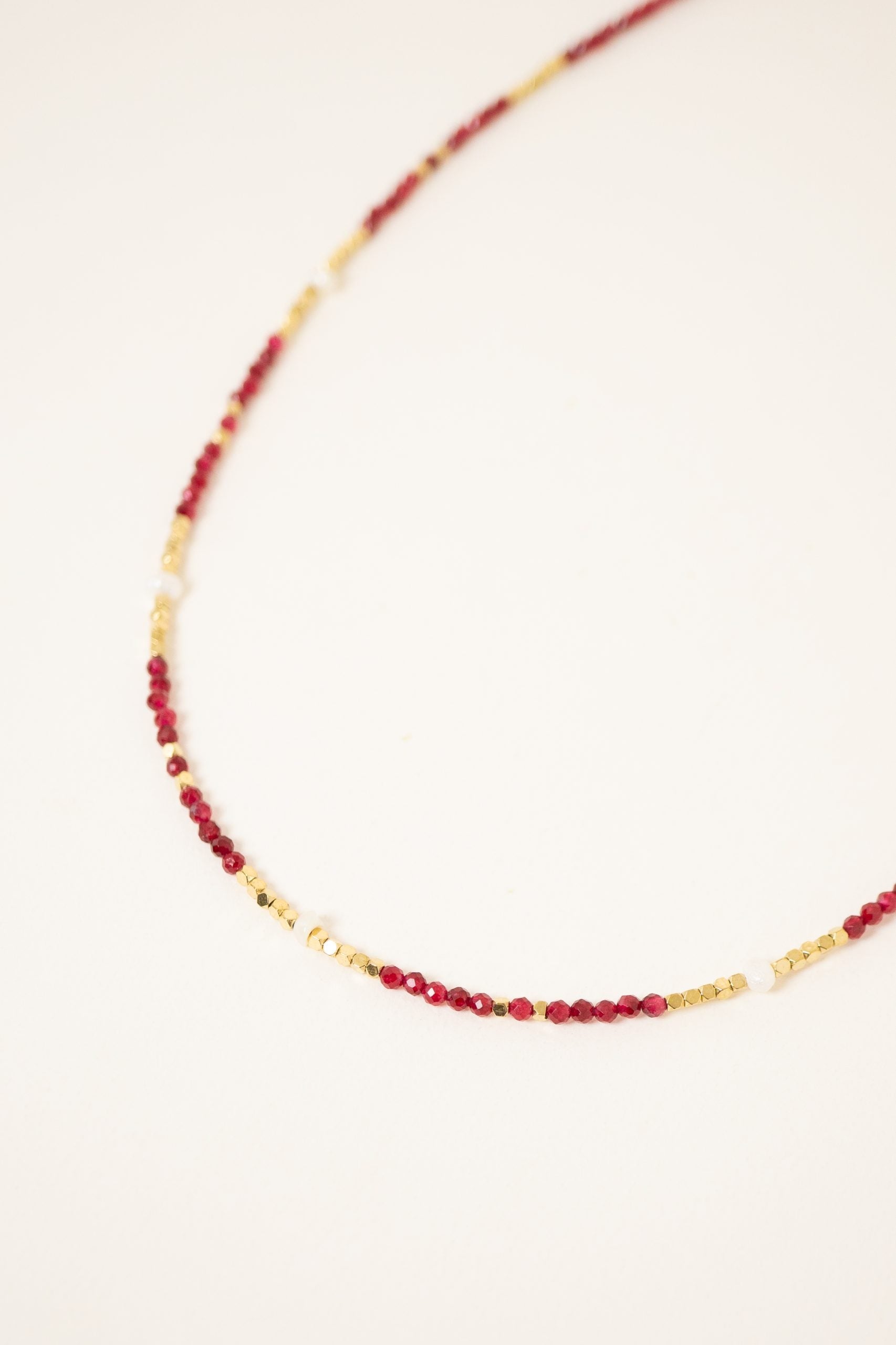 collier-pio-acier-grenat-inoxydable